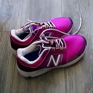 One pair of New Balance sneakers